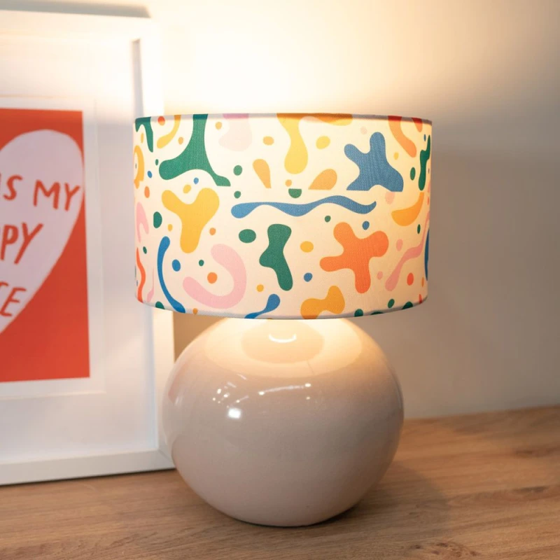 Image of ValueLights Bosco Natural Stone Globe Ceramic Table Lamp with Abstract Shapes Lamp Shade Multi