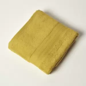 Image of HOMESCAPES Mustard 100% Combed Egyptian Cotton Bath Towel 500 GSM - Mustard
