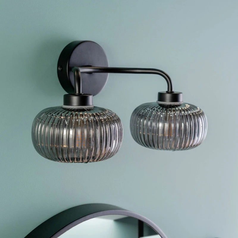 Image of ValueLights Amaia Pair of Matte Black IP44 Rated 2 Way Smoked Ribbed Glass Wall Lights Black
