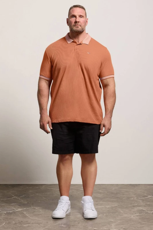 Image of BadRhino BadRhino Men Waffle Polo Shirt in Orange Size: X-Large Orange X-Large Male 5063589905390