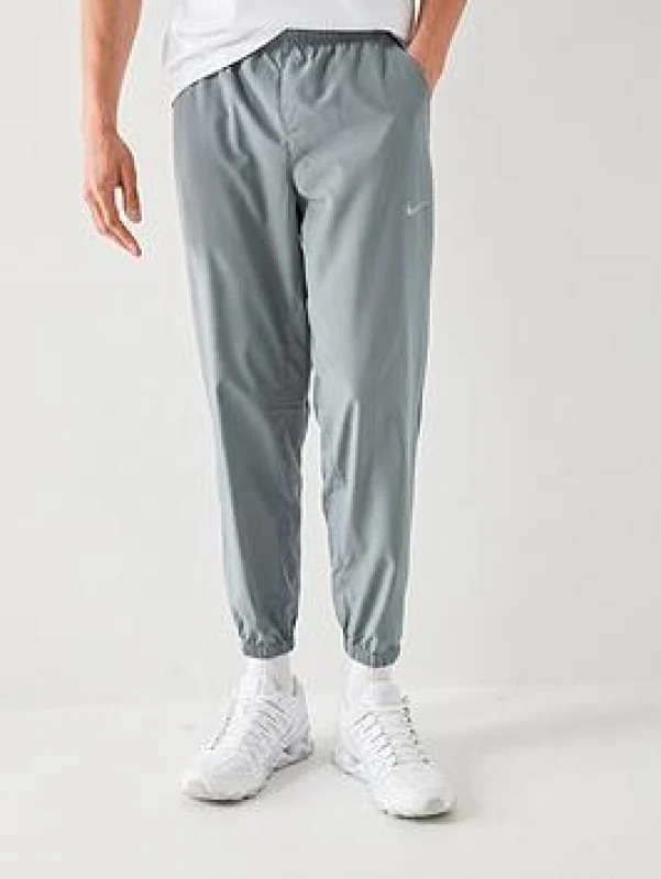 Image of Tapered joggers Nike Dri-FIT Form Gris Male S