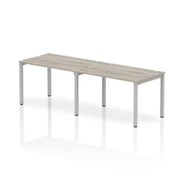 Image of Impulse Bench Single Row 2 Person 1200 Silver Frame Office Bench Desk Grey Oak