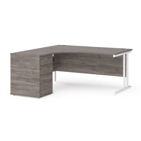 image of Maestro 25 left hand ergonomic desk 1600mm with white cantilever frame and desk high pedestal - grey oak