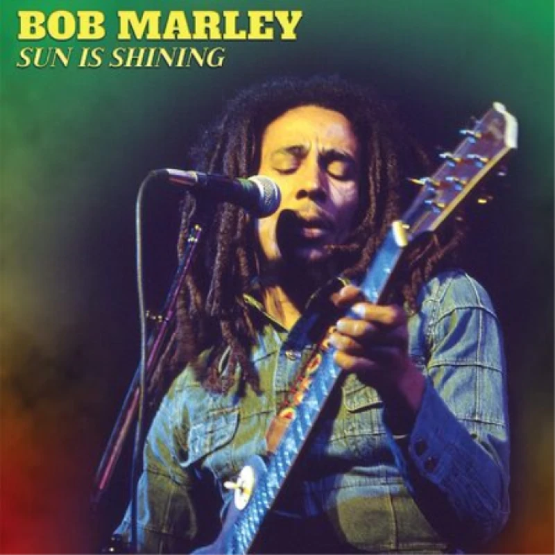 Image of Bob Marley Bob Marley Sun Is Shining - Limited Edition Yellow Marbled 7" Vinyl Single in Black One Size Unisex 0889466262340