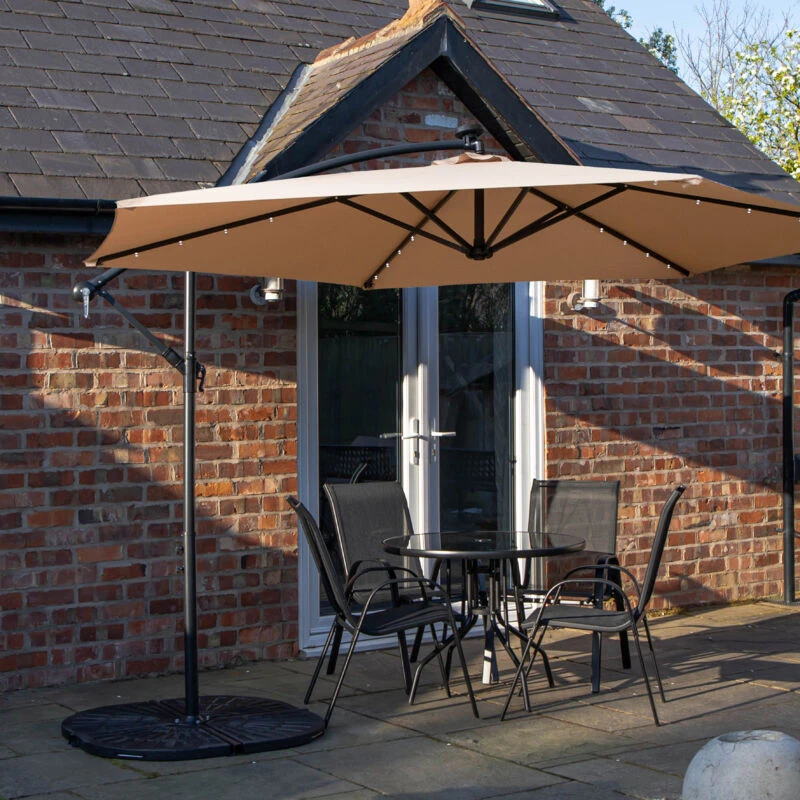 Image of Outdoor 4 Person Round Glass Top Garden Dining Table Chairs With Beige Banana Lit Parasol and Base