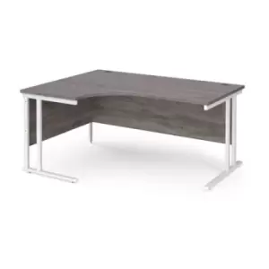 image of Maestro 25 left hand ergonomic desk 1600mm wide - white cantilever leg frame and grey oak top