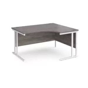 Image of Maestro 25 right hand ergonomic desk 1400mm wide - white cantilever leg frame and grey oak top