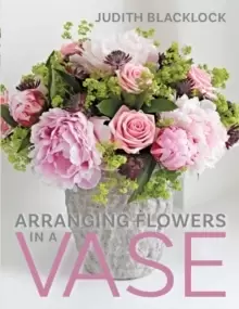 Image of Arranging Flowers in A Vase