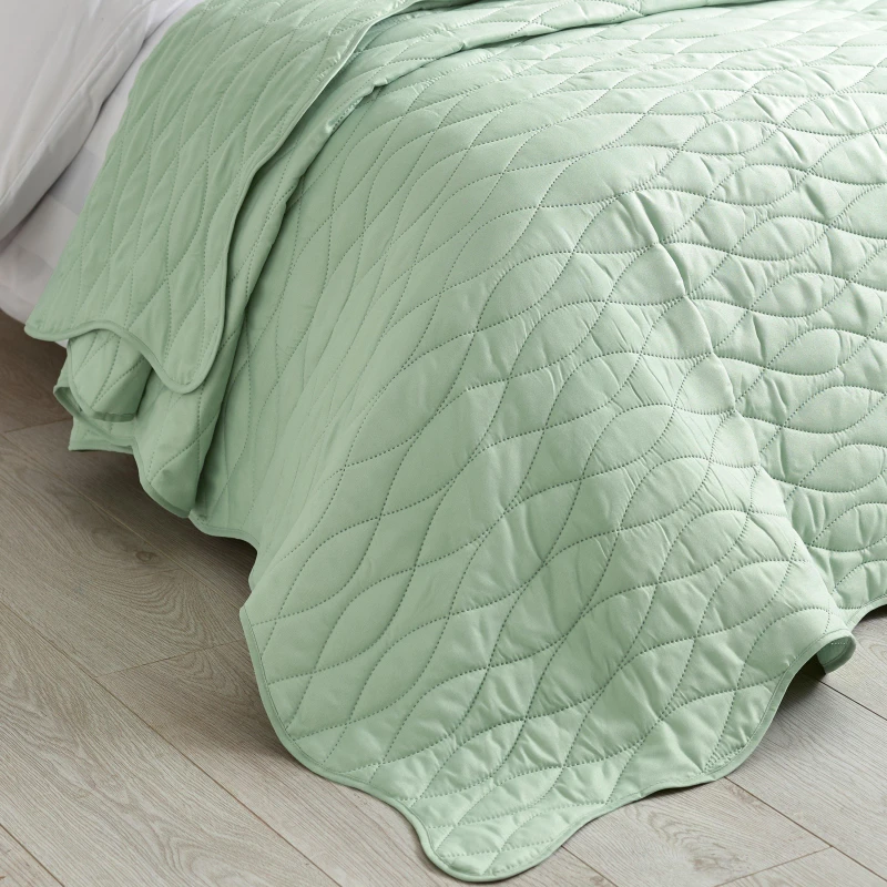Image of Catherine Lansfield Scallop Waves 240cm x 260cm Quilted Bedspread Green