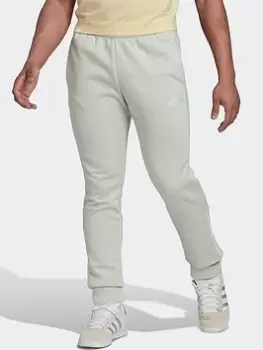 Image of adidas Essentials Colorblock Fleece Joggers, Green Size M Men