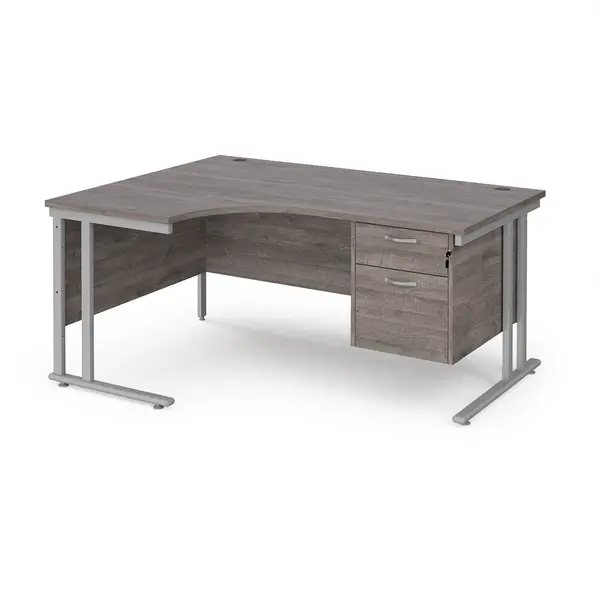 Image of Maestro 25 left hand ergonomic desk 1600mm wide with 2 drawer pedestal - silver cantilever leg frame, grey oak top
