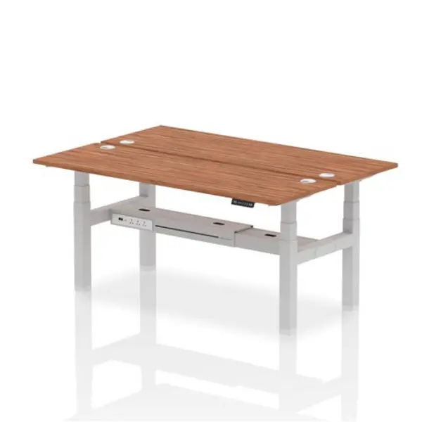 Image of Air Air Back-to-Back 1800 x 600mm Height Adjustable 2 Person Bench Desk Walnut Top with Cable Ports Silver Frame HASCP2P18600WNTS