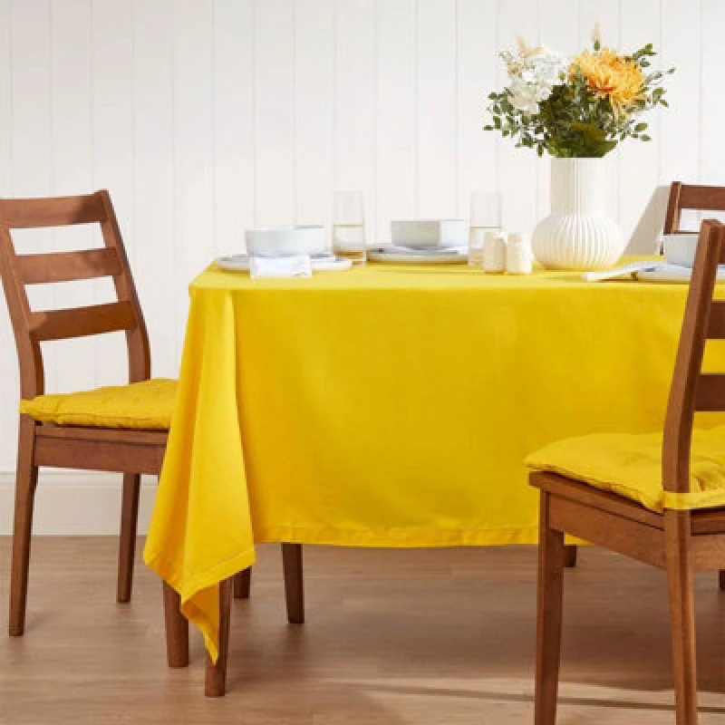 Image of Homescapes Plain Cotton Tablecloth, 137cm x 137cm Yellow