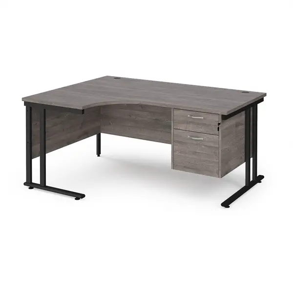 image of Maestro 25 left hand ergonomic desk 1600mm wide with 2 drawer pedestal - Black cantilever leg frame, grey oak top