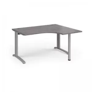 image of TR10 right hand ergonomic desk 1400mm - silver frame and grey oak top