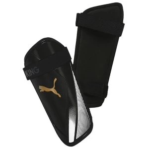 Puma King ES 2 Slip In Guards Black/Gold Medium