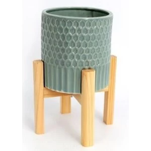 Image of Large Ceramic Teal Coloured Planter On Wooden Stand