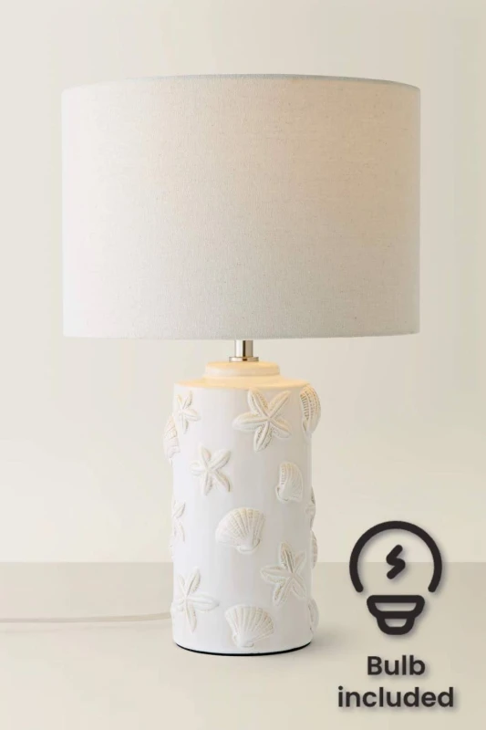 Image of ValueLights Selene Linen Shade Ceramic Embossed Seashell Table Lamp with Bulb in Cream Cream Unisex