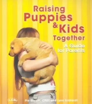 Image of Raising puppies & kids together - Pia Silvani - Paperback - Used