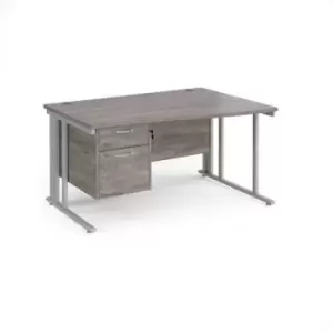 image of Maestro 25 right hand wave desk 1400mm wide with 2 drawer pedestal - silver cable managed leg frame and grey oak top