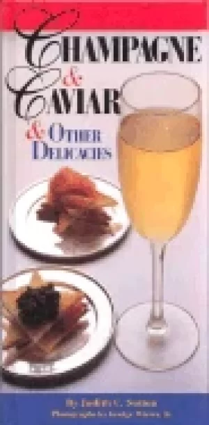 Image of champagne and caviar and other delicacies