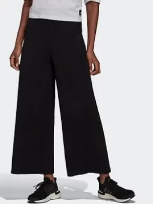 Image of adidas Sportswear Mission Victory Wide Tracksuit Bottoms, Black Size XL Women