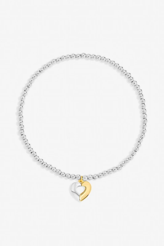 Image of Inicio Womens Sterling Silver Plated Two Tone Heart Stretch Bracelet - Gift Pouch Multicolor Female One Size