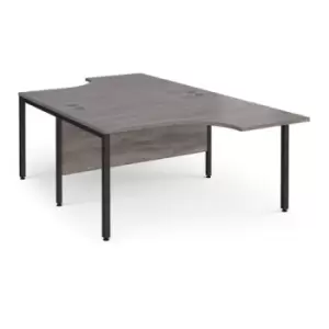 Image of Maestro 25 back to back ergonomic desks 1400mm deep - Black bench leg frame and grey oak top