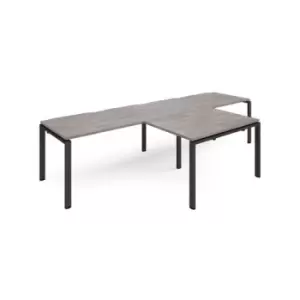 image of Adapt double straight desks 3200mm x 800mm with 800mm return desks - Black frame and grey oak top