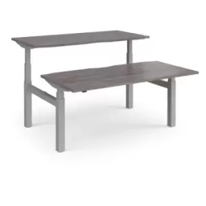 image of Elev8 Touch sit-stand back-to-back desks 1600mm x 1650mm - silver frame and grey oak top