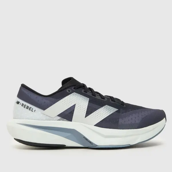 Image of New Balance fuelcell rebel v4 trainers in navy & white Navy & White UK 8 (EU 42)