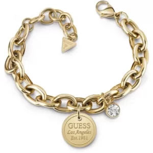 image of GUESS gold plated chain bracelet with coin charm and Swarovski crystal.