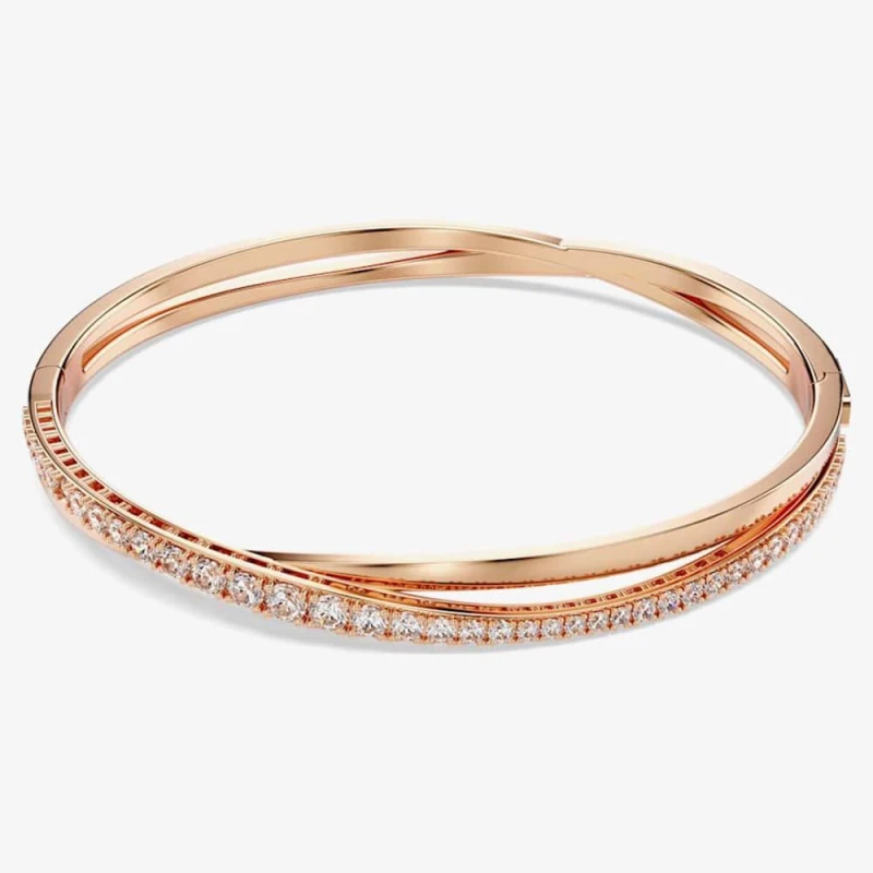 Image of Swarovski Twist Rose Gold Tone Plated Crystal Bangle 5620552 Rose Gold female