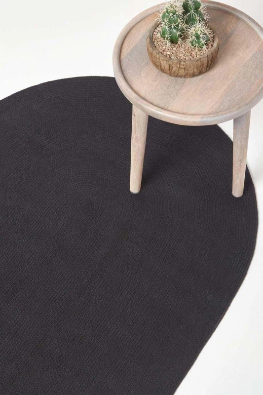Image of Homescapes Black Handmade Woven Braided Round Rug, 150 Cm