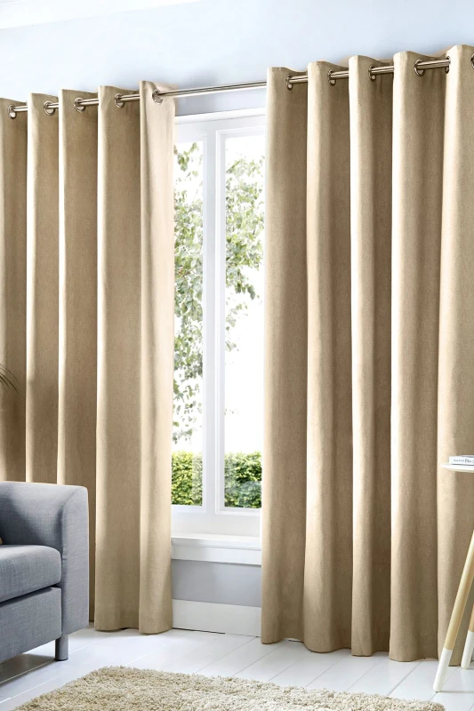 Image of Fusion 'Cannes' 100% Cotton Black Out Plain Dyed Eyelet Curtains in Natural Size: 117cm width x 183cm drop Natural Unisex 117cm width x 183cm dr