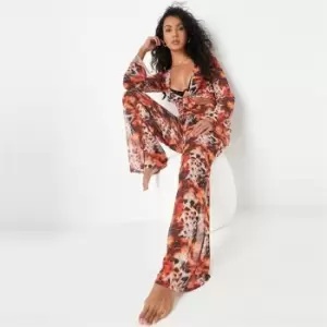 Image of Missguided fire leopard flared trouser - Red