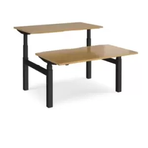 Image of Height Adjustable Desk Back To Back Rectangular Desks 1400mm Oak Tops With Black Frames Elev8 Touch