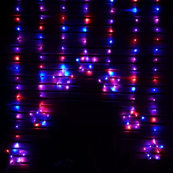 image of 1.2m Battery Operated Christmas Star Curtain Lights with 140 Rainbow LEDs