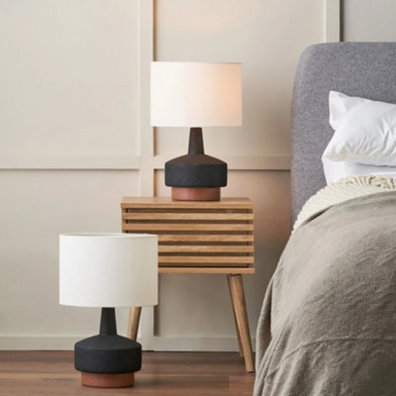 Image of Pacific Lifestyle Set Of 2 Elio Black And Wood Effect Textured Ceramic Table Lamp