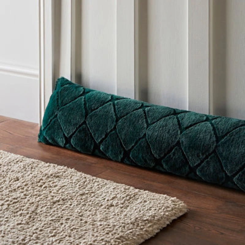 Image of Catherine Lansfield Catherine Lansfield 'Cosy Diamond' Draught Excluder in Bottle Green Bottle Green One Size Unisex 5057681116563