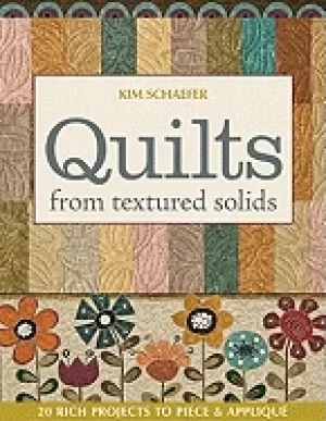 Image of quilts from textured solids 20 rich projects to piece and applique