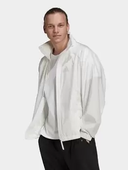 Image of adidas Traveer Wind Jacket, Beige Size M Women