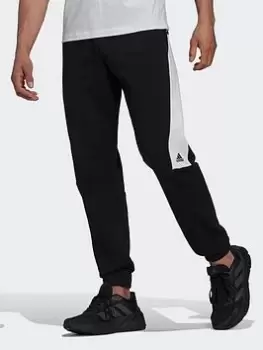 Image of adidas Future Icons Embroidered Badge Of Sport Joggers, Beige, Size S, Men