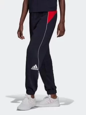 Image of adidas Essentials Colorblock Loose Joggers, Blue Size M Women