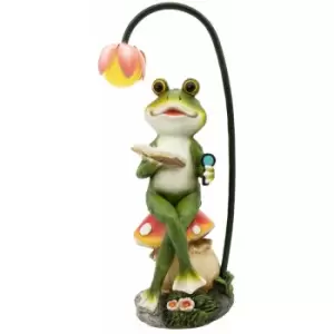 image of Solar Powered Light-Up Frog Reading On A Mushroom Garden Ornament