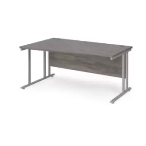 Image of Maestro 25 left hand wave desk 1600mm wide - silver cantilever leg frame and grey oak top