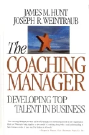 Image of coaching manager developing top talent in business