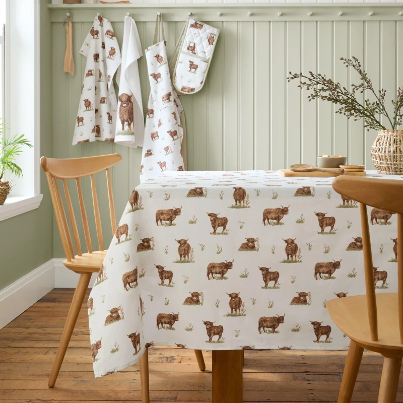 Image of Catherine Lansfield Catherine Lansfield 'Angus Highland Cow' Cotton 137x178cm Table Cloth in Natural Natural One Size Unisex 5057681188300