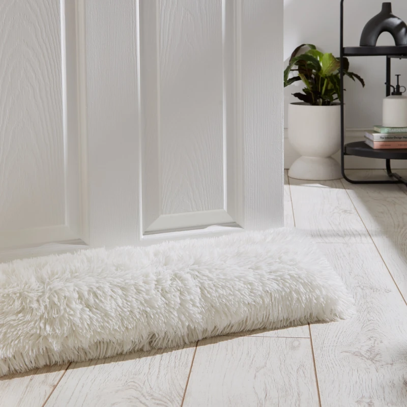 Image of Catherine Lansfield Cuddly Faux Fur 90cm x 20cm Draught Excluder Cream