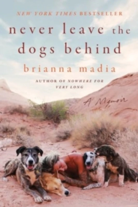 Image of Never Leave the Dogs Behind. Paperback. By Brianna Madia Books